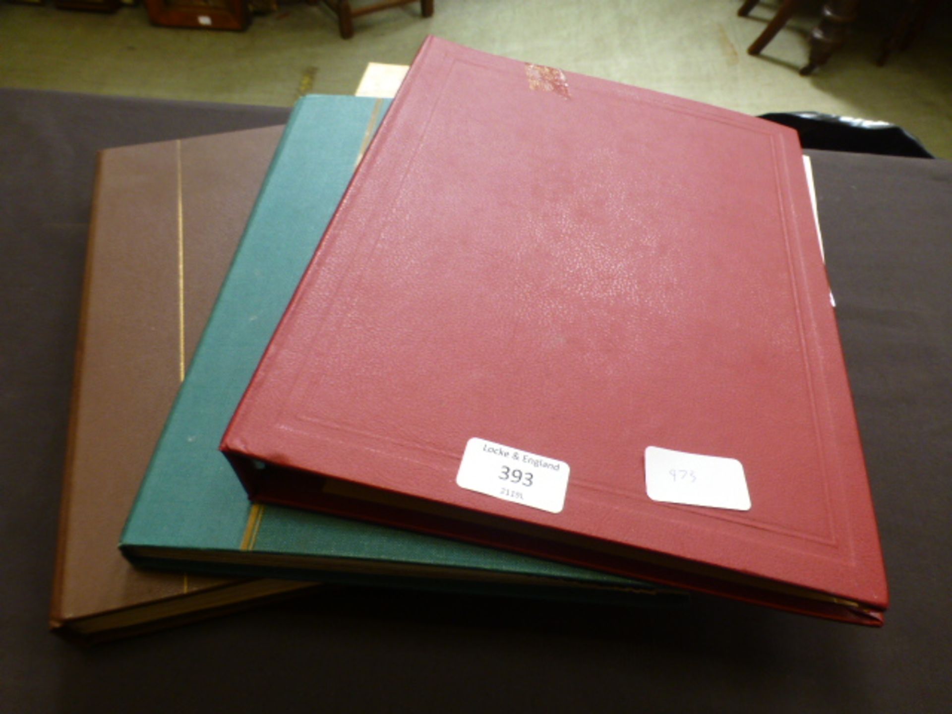 Three stamp albums containing assorted stamps