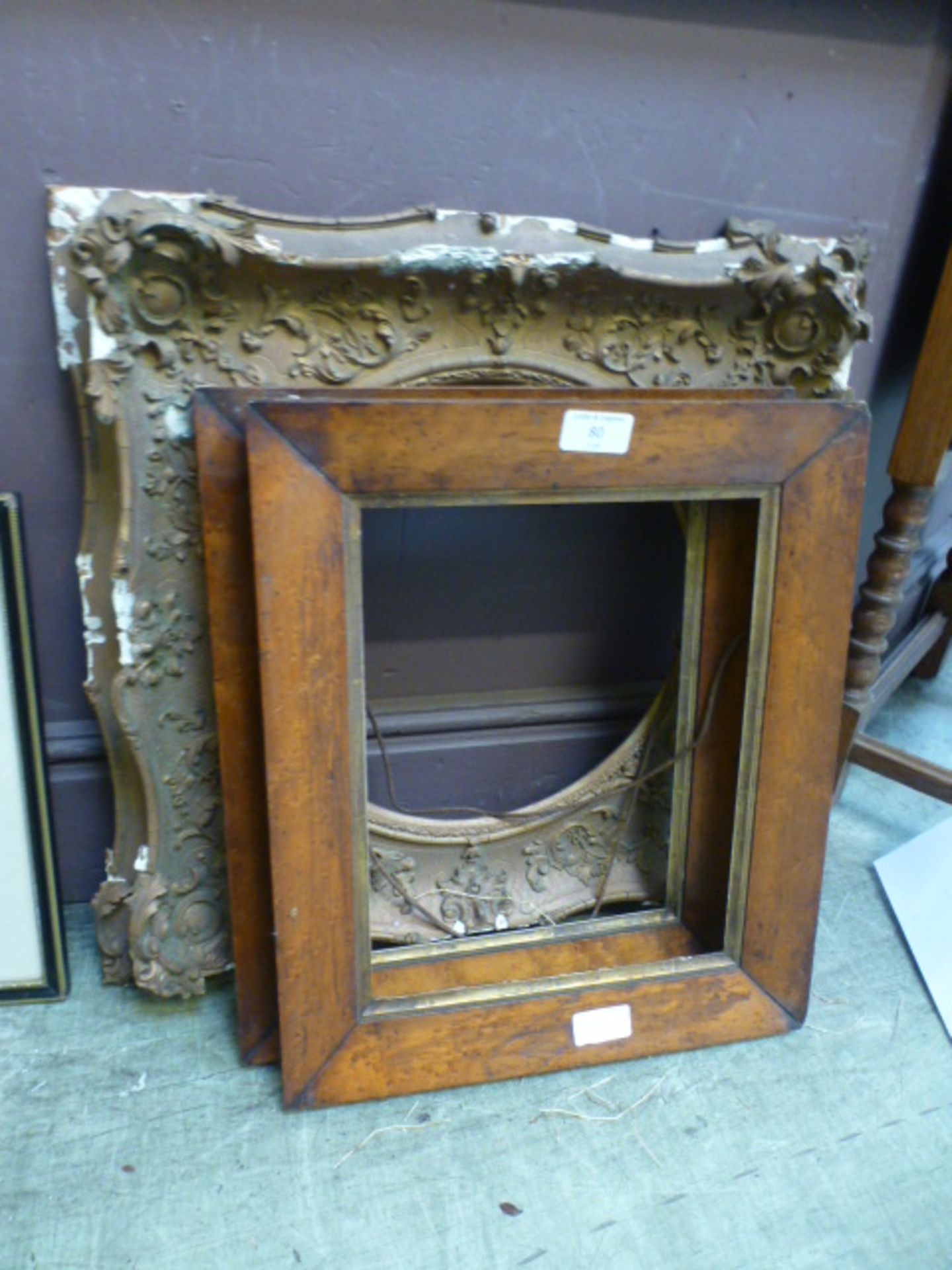 A pair of bird eye maple veneered picture frames together with an ornate gilt frame