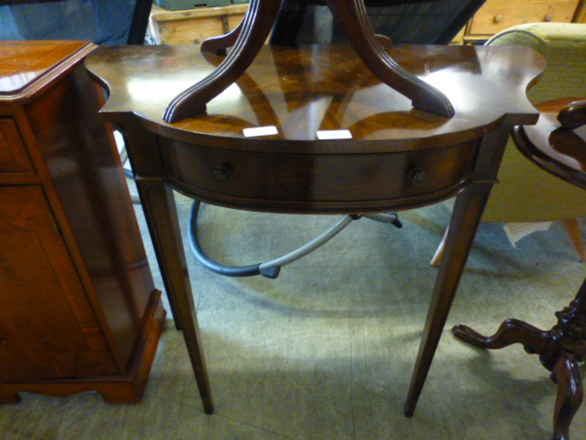 A reproduction mahogany and banded single drawer hall table