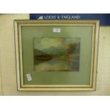 A framed and glazed watercolour of lake and mountain scene