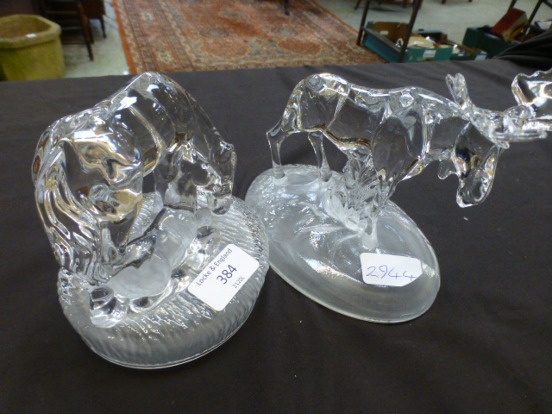 Two glass models of horses and stag