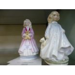 A Royal Doulton figure Faith HN3082 together wit a Royla Doulton figure Hope HN3061 (A/F)