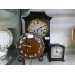 An early 20th century oak cased mantle clock together with an Art Deco Metamec clock and a small