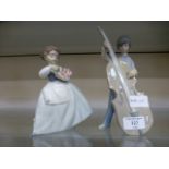A Nao figure of a girl with flowers together with a Lladro figure of a boy with cello