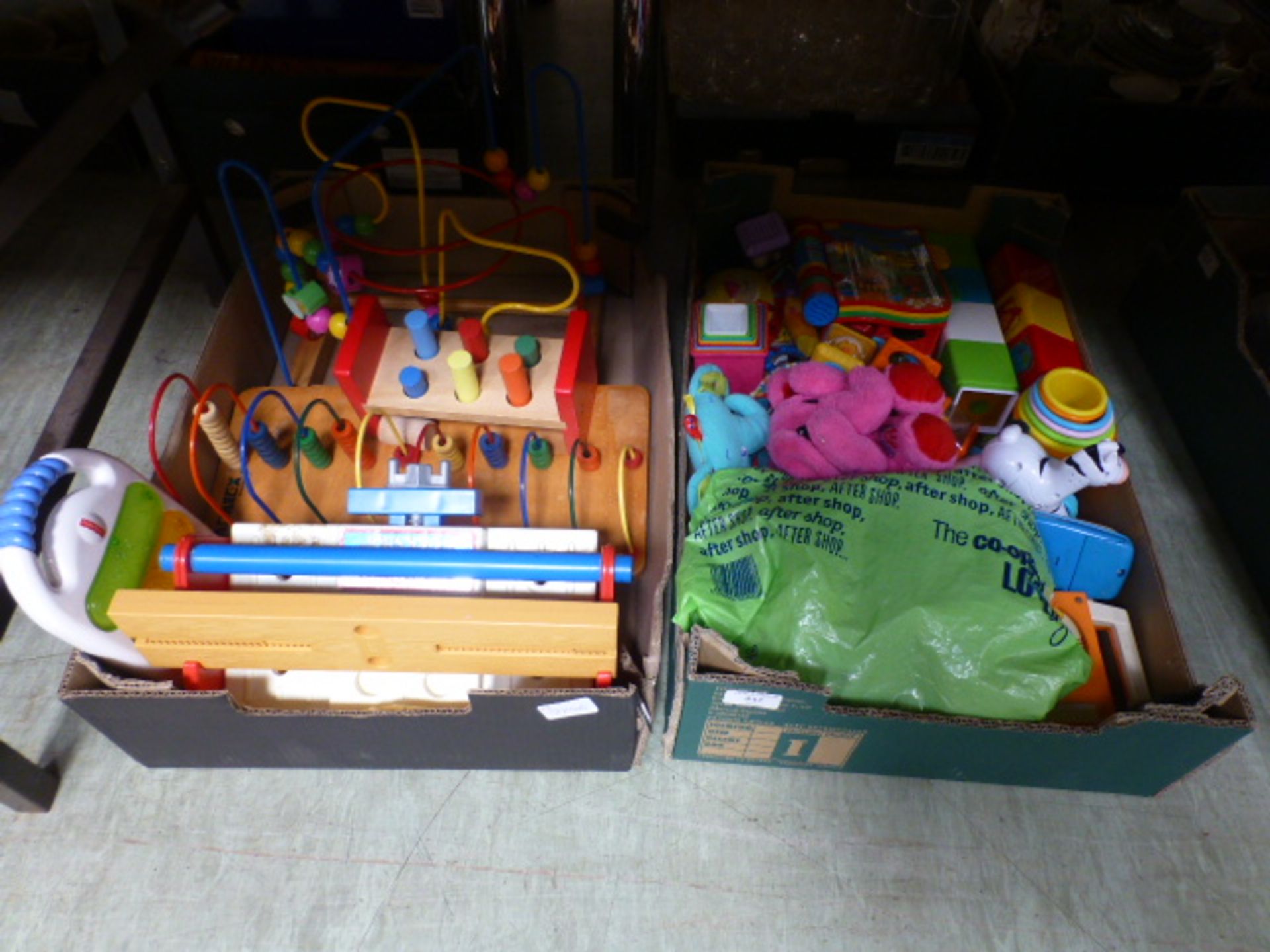 Two trays of children's toys