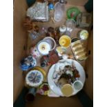 A tray containing a quantity of ceramic and glassware to include figurines, Wade Whimsies,