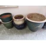 Five glazed garden pots