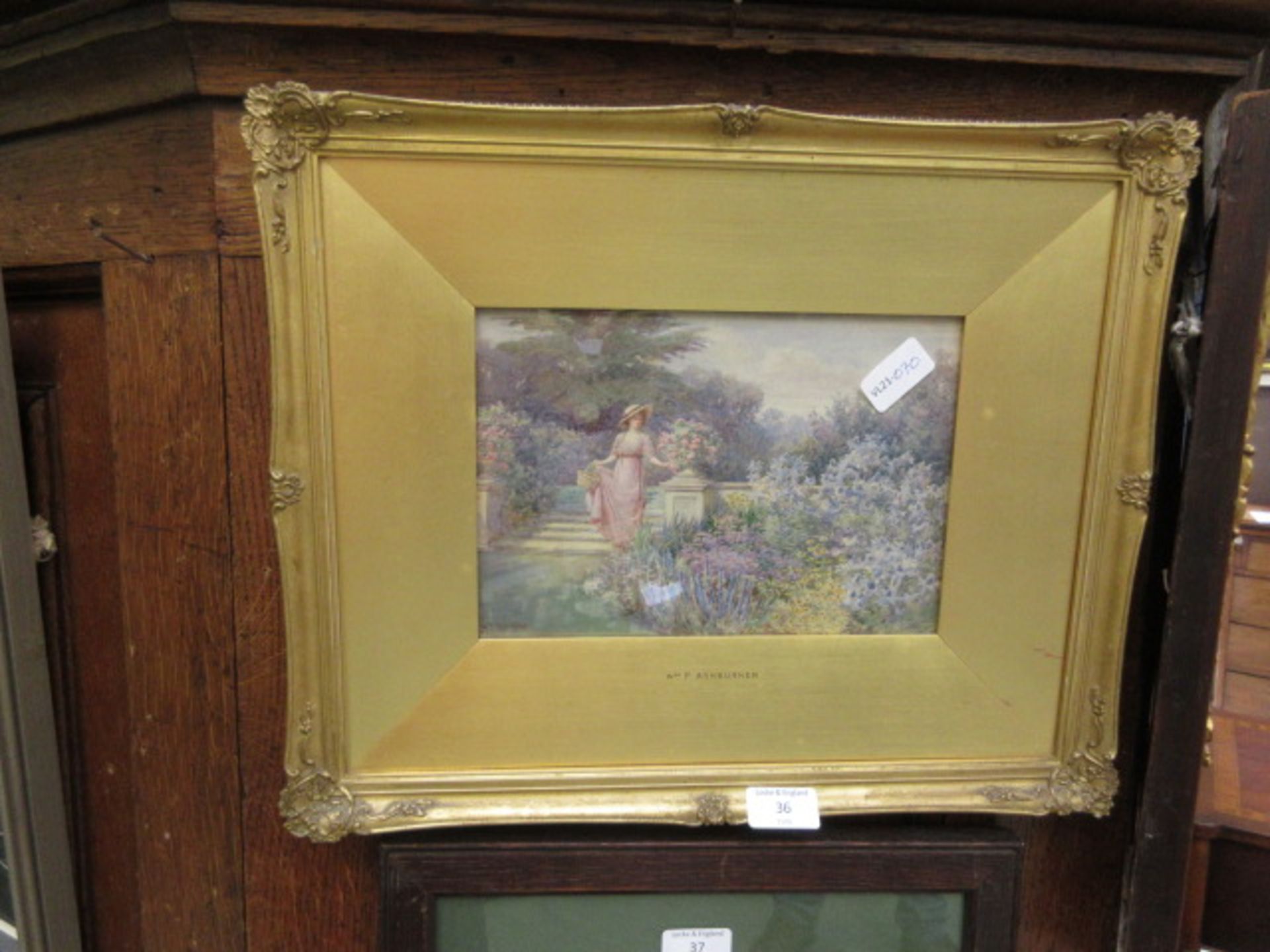A gilt framed and glazed watercolour of classical lady in garden scene signed Ashburner