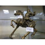 A brass model of Genghis Khan on horseback
