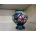 A small Moorcroft vase