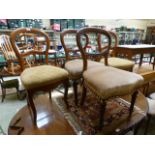 Two pairs of late Victorian balloon back dining chairs