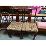 A pair of Chinese hardwood dining chairs