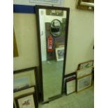 A three quarter length mahogany veneer framed wall mirror A/F