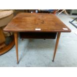 A mid-20th century occasional table