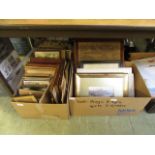 Two boxes containing an assortment of pictures, maps, needlework's etc.