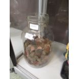 A jar of assorted coinage