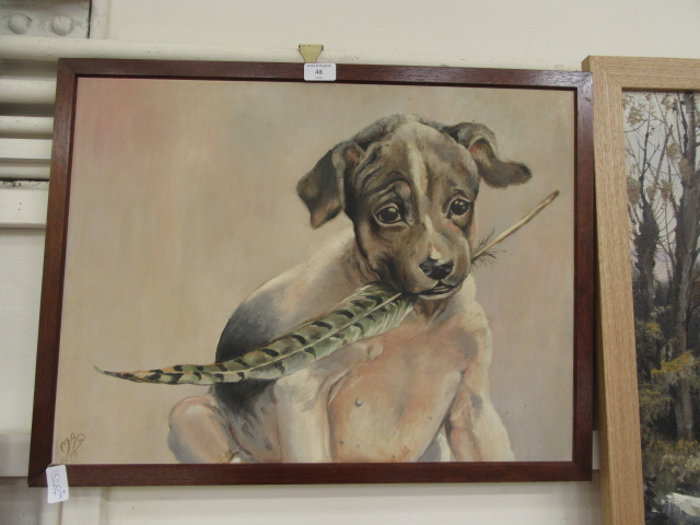 A framed oil of dog with feather