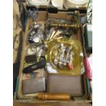 A tray containing an assortment of items to include spoons, trivet stand, collectable's etc.