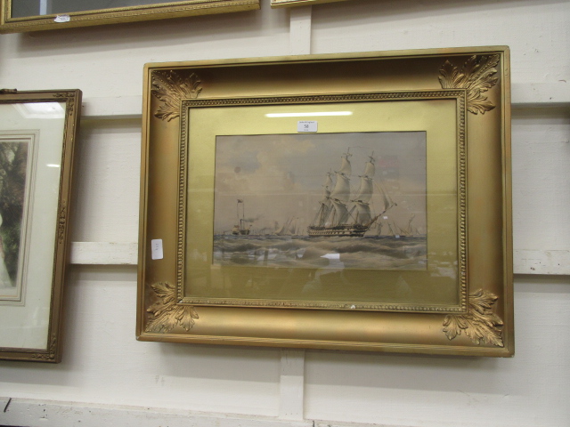 A gilt framed and glazed print of sailing ships