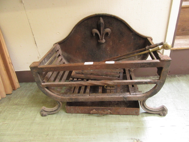 A cast iron fire basket