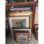 A large quantity of assorted framed and glazed prints of various subjects to include motor vehicles,