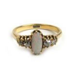 A late 19th century yellow metal, diamond and opal ring marked '18ct',