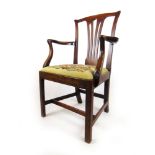 An 18th century mahogany open arm chair with needle work upholstered seat, h. 98 cm, w. 61 cm, d.