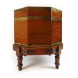 A 19th century rosewood and brass banded octagonal cellarette,