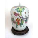 A large late 19th/early 20th century Chinese ginger jar and lid, the body decorated with figures,