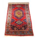 A handwoven Persian rug,