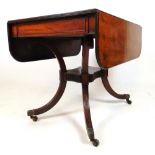 A late 19th century mahogany pembroke table,