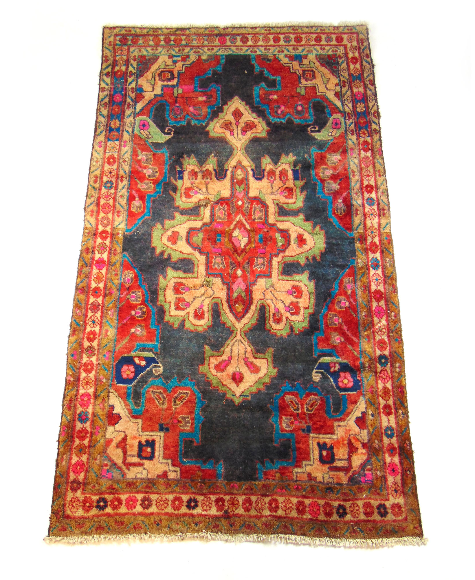 A handwoven Persian wool rug,