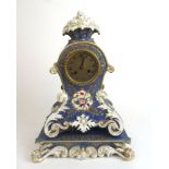 A 19th century French porcelain clock and stand,