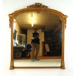 A 19th century gilt wood over mantle mirror,
