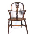 An early 19th century elm, beech and fruit wood Windsor chair, h. 100 cm, w. 52 cm, d.