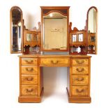 An Edwardian walnut dressing table,