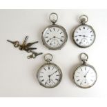 A group of four silver hallmarked open face pocket watches together with a selection of keys.