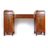 A Regency mahogany, ebony and rosewood cross banded twin pedestal sideboard,