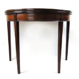 An 18th century mahogany demi-lune games table,