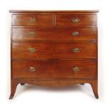 A George III mahogany and ebony strung chest of two short over three long drawers, h.