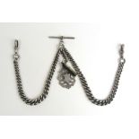 An early 20th century silver double Albert graduating pocket watch chain suspending a fob and