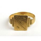 A 22ct gold signet ring having engraved panel. UK size R. Approx weight 4.