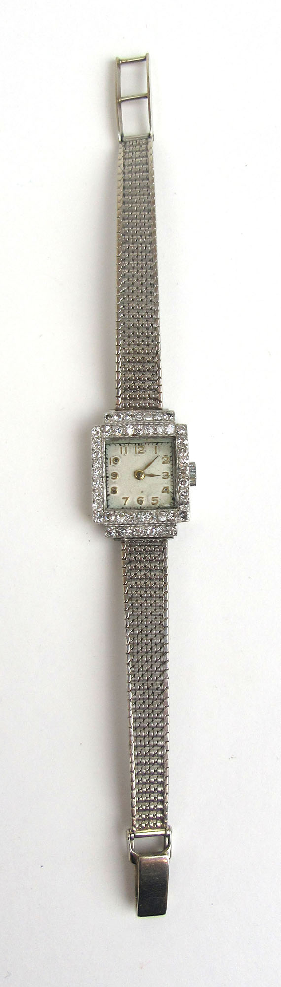 A ladies 9ct white gold and diamond set cocktail watch.