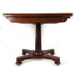 A 19th century mahogany tea table,