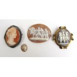 A Victorian yellow metal mounted cameo brooch depicting the Three Graces,