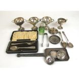 An assortment of silver items to include trophies, spoons, mirror back etc. Various hallmarks.