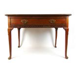 An 18th century elm and mahogany banded side table,