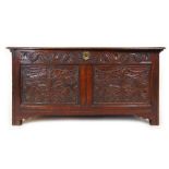 An 18th century oak coffer,