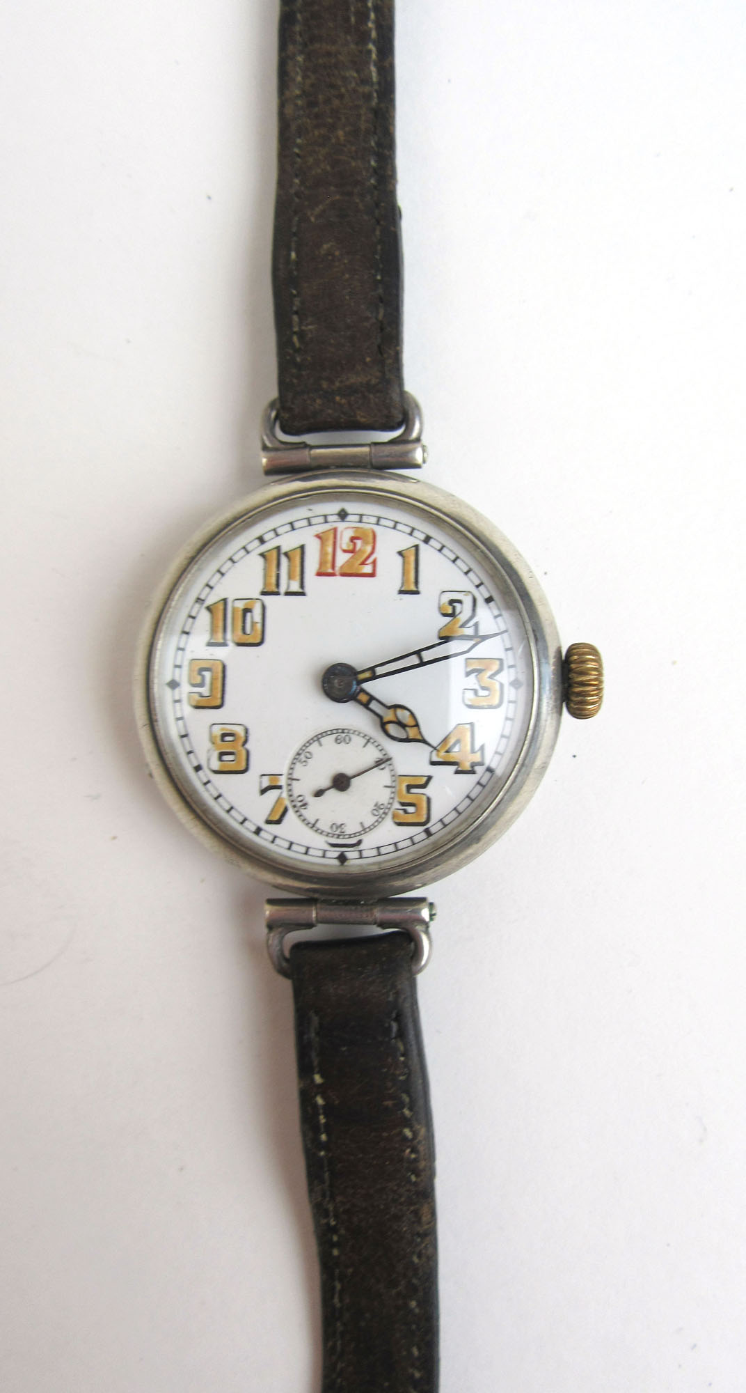 An early 20th century silver trench watch, the dial with luminous Arabic numerals and hands. - Bild 2 aus 3