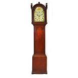 An 18th century oak longcase clock, the enameled face with Roman numerals, second and date dials,